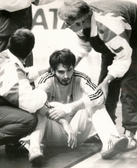 Handball World Cup in Czechoslovakia. Michal Barda is waking from unconsciousness, he was hit in his face by a French player, Philippe Gardent. 1990
