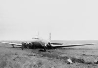 The only photograph from the ominous 11th September of 1946, when the Douglas DC-3/C-47A-80-DL (OK, cn 19535, sn 43-15069) of the Czechoslovak Airlines needed to perform an emergency landing at 1746. Captain Irving took off at 1205 from Amsterdam and there were 13 passengers and 5 crew on board. At 1546, the plane flew over the radar at the Praha Ruzyně airport and flew a hold above the clouds at 1700 metres. At 1625, in very inclement weather, the aircraft started to descend. After four unsuccesfull attempts at landing, the aircraft kept flying a hold around the airport. At the same time, a PanAm Lockheed Constellation with full fuel tanks was attempting to land so captain Irving's DC-3 had to keep waiting. The PanAm's Constellation decided to continue to Brussels. The DC-3, after running out of fuel, had to land at a field near Dobrovíz. Captain Irving and the wireless operator Šulc were injured but there were no casualties.