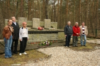Sagan - after having lit a candle for each member of the delegation and having laid the bouquet, this photograph was taken. At the left, the family members of the deceased imprisoned airmen, Iveta Irvingová, Josef Bryks a Mgr. Ivana Škarvadová. On the right, historian and an expert on the Sagan events and the POW camp system, Vladislav Severin, who also researches the Czechoslovak paratrooper groups operating in the eastern part of Czech Republic. Next to him (middle of the photograph), standing, lieutenant colonel Ing. Jan Čelechovský, a former army pilot and one of the designated drivers of the group and next to him to the right, nephew of two RAF airmen (Vít Angetter and Albín Naswetter), Radovan Stýblo. The others humbly stood aside.