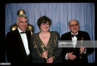Karel Černý sand Patrizia von Brandenstein receive Oscar award in production design for Amadeus from Steve Martin on March 25, 1985