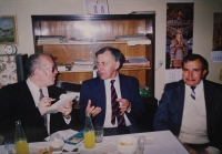 Radomír Malý in the photo on the left as the editor of the People's Democracy speaks with the Deputy Prime Minister of National Understanding František Reichel.JPG