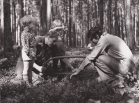 Sergej Machonin with his friend and children at work in a forest in Vysočina