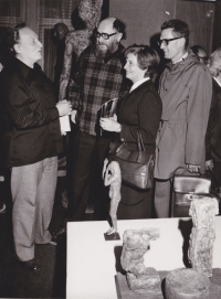 Sergej Machonin debating with his friends on an exhibition of his friend, sculptor Olbram Zoubek