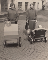 Stanislav Duchek in a baby stroller with his mother. In the pram on the left is his sister accompanied by his mother's friend Marcela Kuncová