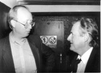 Petr Brod, the first permanent correspondent of Free Europe in Prague, looks down at his boss, the director of the Czechoslovak editorial office in Munich, Pavel Pecháček, about 1991