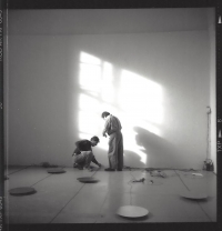 Artists Paul Panhuysen and Paul DeMarinis installing an exhibition in Plasy Monastery, 1994