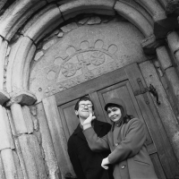 Ivan Martin Jirous and Věra Jirousová in front of the portal of the church in Lukov u Humpolce, mid-1960s
