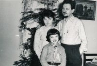 With her parents, Zdeňka and Přemysl Mucha, Christmas 1968 