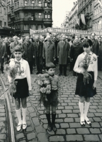 Her brother, Antonín Mucha - a Boy Scout among Pioneers, with flowers for Alexander Dubček, May 1st, 1968 