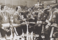 Hockey players from Poldi Kladno celebrate the Czechoslovak championship. František Kaberle Senior is all the way to left, Eduard Novák celebrates with champagne