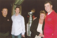 František Kaberle Senior (all the way on the left) with his sons Tomáš (second from the left) and František and his wife Ludmila. Behind them is the Stanley Cup which František Kaberle Junior won with his team, the Carolina Hurricanes, in 2006