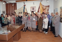 Exhibition in honor of 130 years of Sokol in the Blatsko Museum. Helena Zvánovcová is centered with a glass of wine.