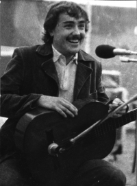 During a concert, mid 1970s