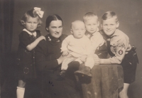 With her mother and siblings, Helena on the left