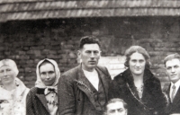Father Karel Novák is in the middle, his mother Barbora Nováková is on his right 