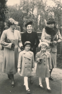 Hana Fousová (girl on the left) with her mother (woman in black) and her girlfriends 