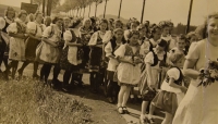 Prime divine service June 4, 1944, the parade of young people in the costumes