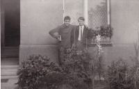 Miloš with a friend from Romania in front of his house, Smíchov, 1966