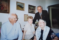Vlastislav (standing) with his brother and a family, Prague 2002