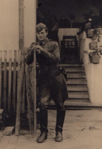 Bořivoj Sedláček 18 years old, shortly after demobilization, a picture at the entrance to his house in Gudovac, June 1945
