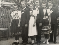 Helena Aková in the traditional folk fress of Rozvadze (second from the right)