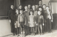 Bohumil Nádhera (first from the left in the first row) in a school photo in Dolní Polubný 
