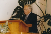 Her husband, Andrej Beňa, preaching in the prayer room of the Church of the Brethren in Česká Skalice, 1992