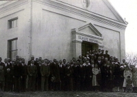 Inhabitants of Michalovka in front of a church