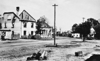 Crossroads of the roads to Opava, Ostrava and Háj, on the left burnt houses of Onderka and Weiss, 1945