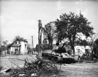 Crossroads of roads to Opava, Ostrava and Háj, Křížek's farm on the left, Stuchlík's house on the right, 1945