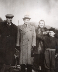 The parents, uncle (left), and the witness, Neštěmice, 1964