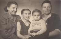 With her mother and sisters in the 1950s