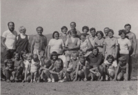 With her siblings and their children, probably 1960s