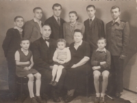 With her parents and siblings in the 1950s