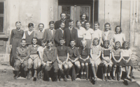 At the primary school in Bernartice, the witness standing third from the right