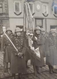 František Fikota's grandfather holding a banner, member of T. G. Masaryk's guard, 1935