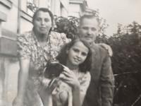 Olga Fikotová with her parents and dog, 1940s