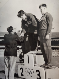 Harold Connolly, father of the witness, receiving his gold medal at the 1956 Melbourne Olympics