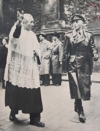Moment from the church part of the wedding ceremony, priest showing where the State Police officer should go, Prague, 1957