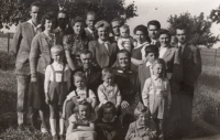 Miroslav Jurníček in the top row, third from the right, family reunion, Hačky, late 1950s