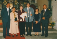 Jaroslav Jirmus (far right) at the christening of his grandson Vojtěch, who continues his grandfather's farming