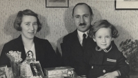 With his parents, 1940s