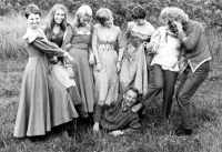 A friend's wedding; as a joke, the witness was captured with women because he had long hair; likely 1972