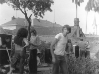 The breaking off of the musical production of the WSS band at the unofficial jam-session of the Olomouc rockers in Náměšt' na Hané by members of the Public Security (Ladislav Šenkyřík in the foreground), 12 July 1975