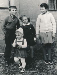 Witness (front) with cousins in Hospozín, ca. 1968