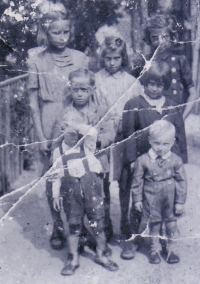 Witness (in white in the middle) with her siblings, cousin and aunt, 1943-1944