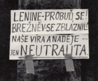 Text against the occupation behind one of Prague's shop windows in 1968
