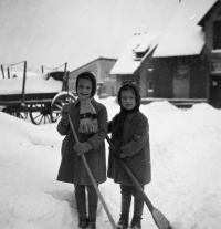 Jitka Havránková (right) with sister Alena in the yard of the Pečky mill