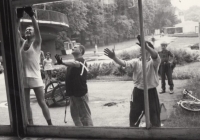 Glazing of the pavilion; Eliška Melounová's husband in a black T-shirt
