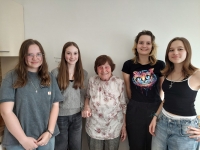 Věra Voženílková with pupils from the Our Neighbours' Stories project